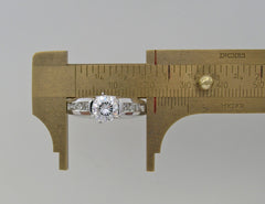 TRADITIONAL ENGAGEMENT RING SETTING WITH CHANNEL SET DIAMOND ACCENT