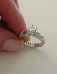 BEAUTIFUL TRADITIONAL ENGAGEMENT RING WITH DIAMOND STUDDED SHANK