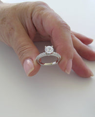 ENGAGEMENT RING SETTING WITH FEMININE DIAMOND ACCENTS