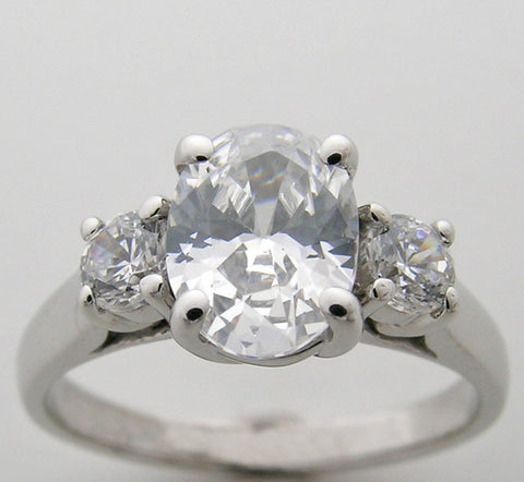 TIMELESS OVAL AND ROUND SHAPE THREE STONE ENGAGEMENT RING SETTING