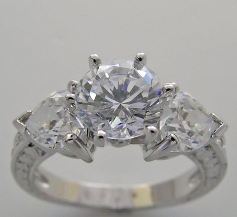 UNUSUAL ROUND AND HEART SHAPE DIAMOND ENGAGEMENT RING SETTING