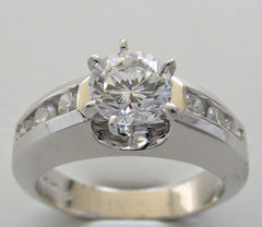 TRADITIONAL ENGAGEMENT RING SETTING WITH CHANNEL SET DIAMOND ACCENT