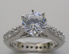 BEAUTIFUL TRADITIONAL ENGAGEMENT RING WITH DIAMOND STUDDED SHANK