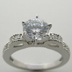 FEMININE DIAMOND ENGAGEMENT RING SETTING.