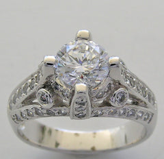 IMPORTANT ENGAGEMENT RING SETTING WITH ROUND DIAMOND ACCENTS 0.67 CT.