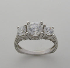 THREE STONE DIAMOND ENGAGEMENT RING SETTING DIAMOND AND ENGRAVING DETAILS