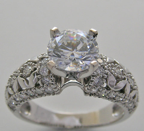 INTERESTING FEMININE DIAMOND ACCENTED RING SETTING