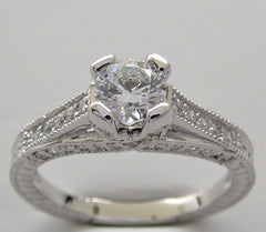 INTERESTING DIAMOND ENGAGEMENT RING SETTING