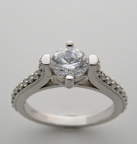 INTERESTING FOUR PRONG DIAMOND DETAILED ENGAGEMENT RING SETTING