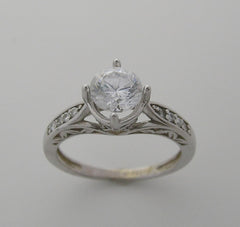 ENGAGEMENT RING SETTING WITH FEMININE DIAMOND DETAILS