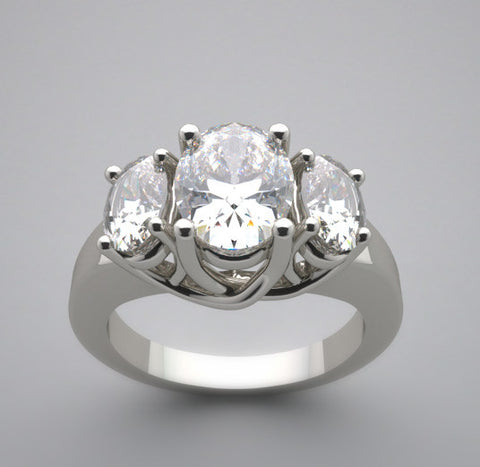 UNUSUAL OVAL THREE STONE DIAMOND RING SETTING