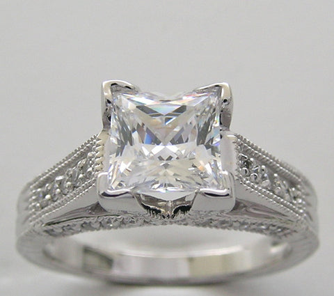 UNUSUAL RING SETTING FOR PRINCESS CUT ACCENTED WITH ROUND DIAMOND DETAILS