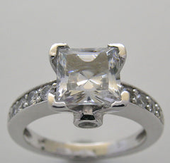 UNIQUE PRINCESS AND ROUND DIAMOND RING SETTING