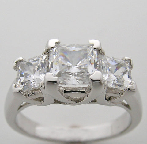 THREE STONE ENGAGEMENT RING SETTING WITH PRINCESS CUT DIAMONDS