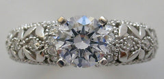 INTERESTING FEMININE DIAMOND ACCENTED RING SETTING