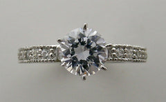 FEMININE DIAMOND ENGAGEMENT RING SETTING.