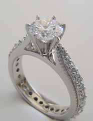 BEAUTIFUL TRADITIONAL ENGAGEMENT RING WITH DIAMOND STUDDED SHANK