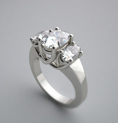 UNUSUAL OVAL THREE STONE DIAMOND RING SETTING