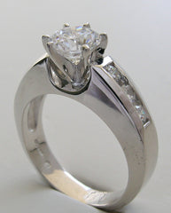 TRADITIONAL ENGAGEMENT RING SETTING WITH CHANNEL SET DIAMOND ACCENT