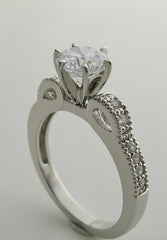 FEMININE DIAMOND ENGAGEMENT RING SETTING.