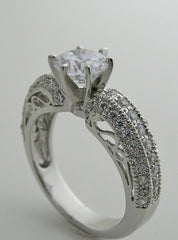 IMPORTANT ENGAGEMENT RING SETTING PAVE SET DIAMONDS