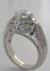 IMPORTANT DIAMOND ACCENTED ENGAGEMENT RING SETTING OR RE-MOUNT RING SETTING