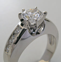 TRADITIONAL ENGAGEMENT RING SETTING WITH CHANNEL SET DIAMOND ACCENT