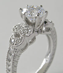 DIAMOND RING SETTING WITH FEMININE FLORAL ACCENTS AND MIL GRAIN DESIGN