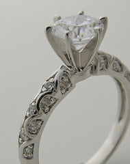 INTERESTING ENGAGEMENT RING SETTING FEMININE DIAMOND DETAILS