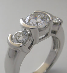 CONTEMPORARY THREE STONE CURVED BAR SET SEMI BEZEL RING SETTING