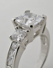 THREE STONE PRINCESS CUT DIAMOND ACCENT RING SETTING