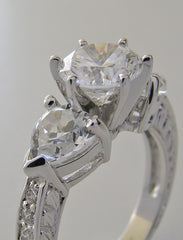 UNUSUAL ROUND AND HEART SHAPE DIAMOND ENGAGEMENT RING SETTING