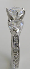 UNUSUAL ROUND AND HEART SHAPE DIAMOND ENGAGEMENT RING SETTING