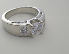 UNUSUAL THREE STONE RING SETTING DESIGN WITH DIAMOND SIDE ACCENTS