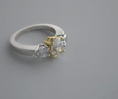 FEMININE TWO TONE GOLD THREE STONE RING SETTING