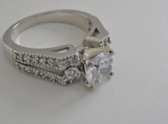 LAVISH ENGAGEMENT RING SETTING FEMININE DESIGN AND DIAMOND DETAIL ACCENTS