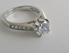 HIGH SET ENGAGEMENT RING SETTING WITH DIAMOND ACCENTS