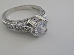 IMPORTANT DIAMOND AND MIL GRAIN ACCENT ENGAGEMENT RING SETTING WITH ENGRAVED DETAILS