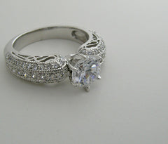 IMPORTANT ENGAGEMENT RING SETTING PAVE SET DIAMONDS