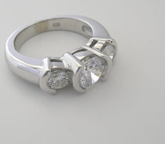 CONTEMPORARY THREE STONE CURVED BAR SET SEMI BEZEL RING SETTING