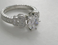 DIAMOND RING SETTING WITH FEMININE FLORAL ACCENTS AND MIL GRAIN DESIGN