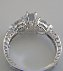 UNUSUAL ROUND AND HEART SHAPE DIAMOND ENGAGEMENT RING SETTING