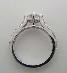 INTERESTING FOUR PRONG DIAMOND DETAILED ENGAGEMENT RING SETTING