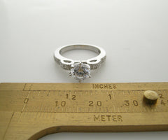 FEMININE DIAMOND ENGAGEMENT RING SETTING.